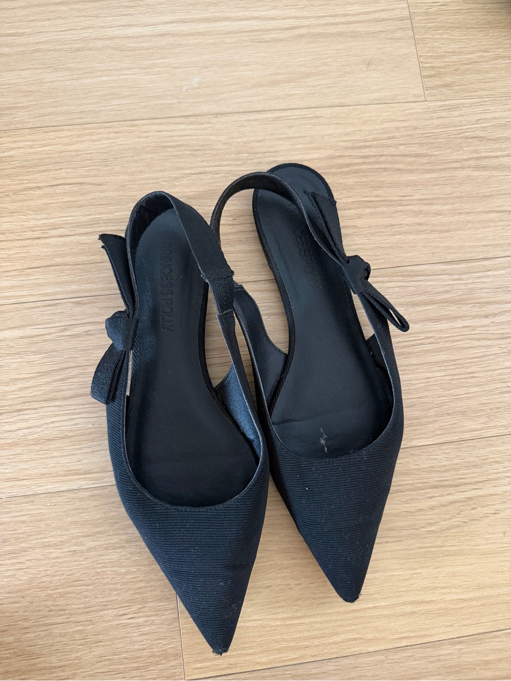 Women’s Black Pointed Slingback Flats with Bow Detail